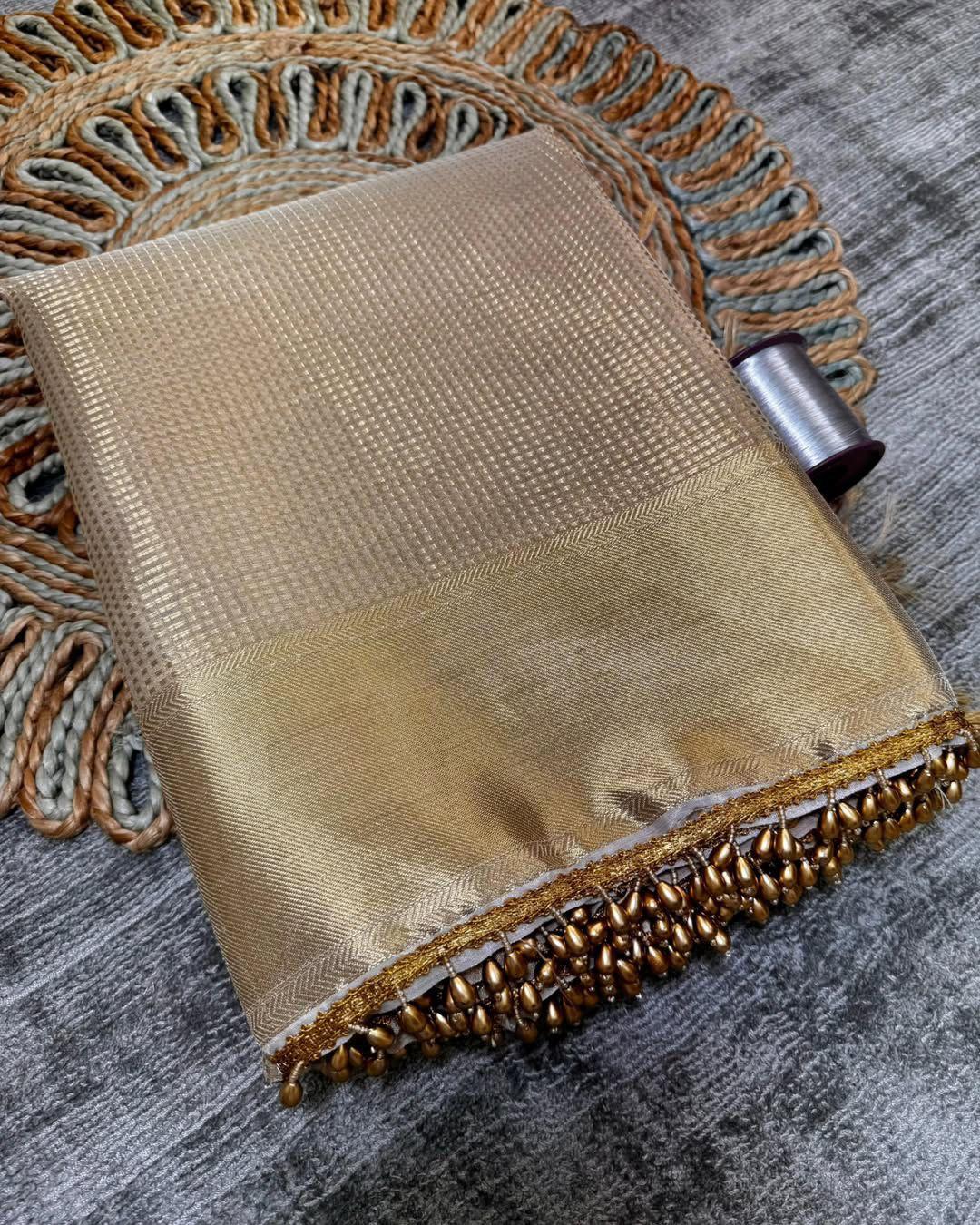 beautiful banarsi golden tissue silk saree with antic gold border